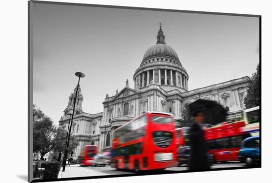 St Paul's Cathedral in London, the Uk. Red Buses in Motion and Man Walking with Umbrella.-Michal Bednarek-Mounted Photographic Print