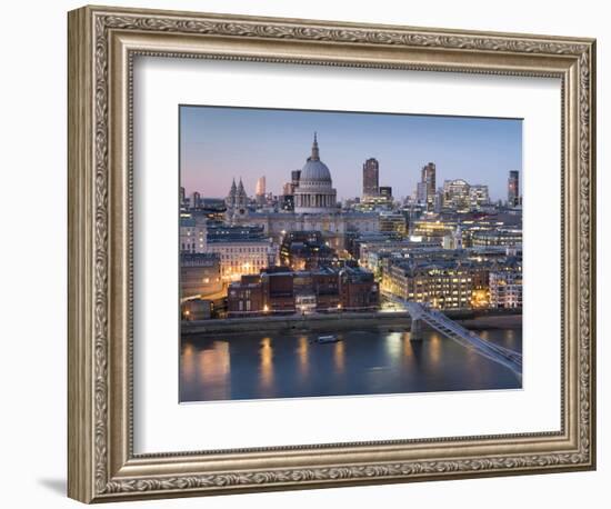 St Paul's Cathedral, London, is seen from across River Thames at dusk-Charles Bowman-Framed Photographic Print