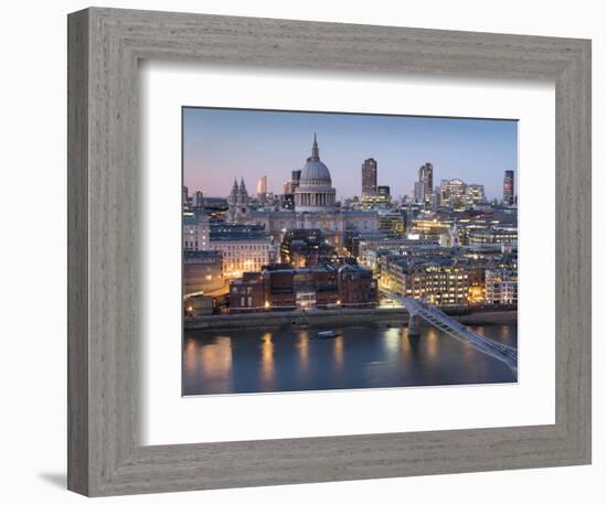 St Paul's Cathedral, London, is seen from across River Thames at dusk-Charles Bowman-Framed Photographic Print