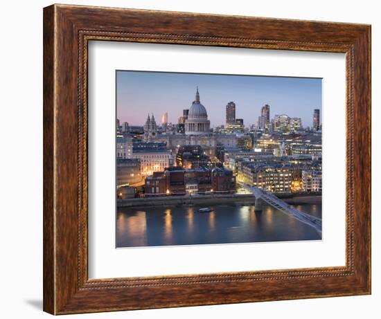 St Paul's Cathedral, London, is seen from across River Thames at dusk-Charles Bowman-Framed Photographic Print