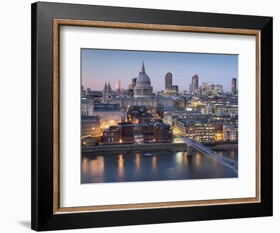 St Paul's Cathedral, London, is seen from across River Thames at dusk-Charles Bowman-Framed Photographic Print