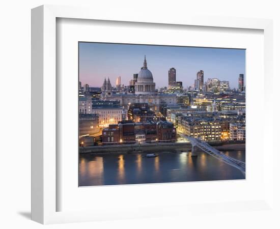 St Paul's Cathedral, London, is seen from across River Thames at dusk-Charles Bowman-Framed Photographic Print