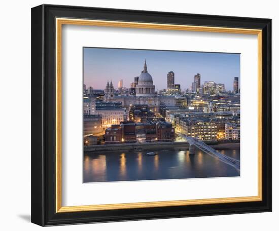 St Paul's Cathedral, London, is seen from across River Thames at dusk-Charles Bowman-Framed Photographic Print