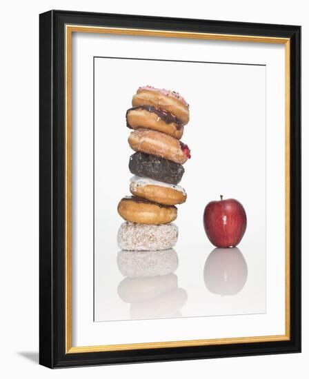 Stack of Donuts and One Apple-null-Framed Photographic Print