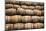 Stacked Pile of Old Whisky and Wine Wooden Barrels-MartinM303-Mounted Photographic Print