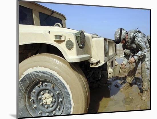 Staff Sergeant Unties a Rope to Tow a Humvee out of the Mud During a Convoy Patrol-Stocktrek Images-Mounted Photographic Print