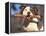 Staffordshire Bull Terrier Carrying Stick in Its Mouth-Adriano Bacchella-Framed Premier Image Canvas