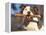 Staffordshire Bull Terrier Carrying Stick in Its Mouth-Adriano Bacchella-Framed Premier Image Canvas