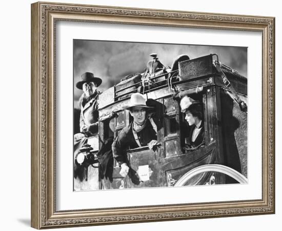 Stagecoach, George Bancroft, John Wayne, Louise Platt, 1939, On The Stagecoach-null-Framed Photo