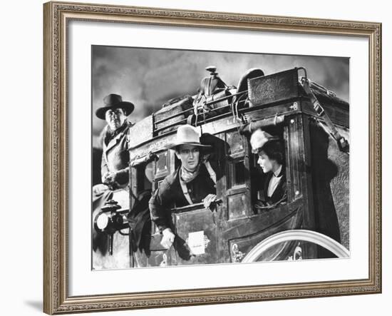 Stagecoach, George Bancroft, John Wayne, Louise Platt, 1939, On The Stagecoach-null-Framed Photo