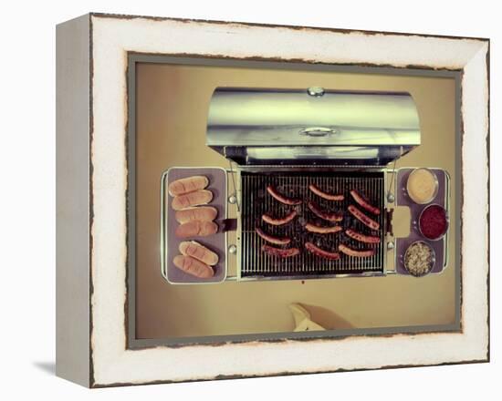 Stainless Steel Barbecue Grill, Upon Which are Buns, Hot Dogs, and Condiments, 1960-Eliot Elisofon-Framed Premier Image Canvas