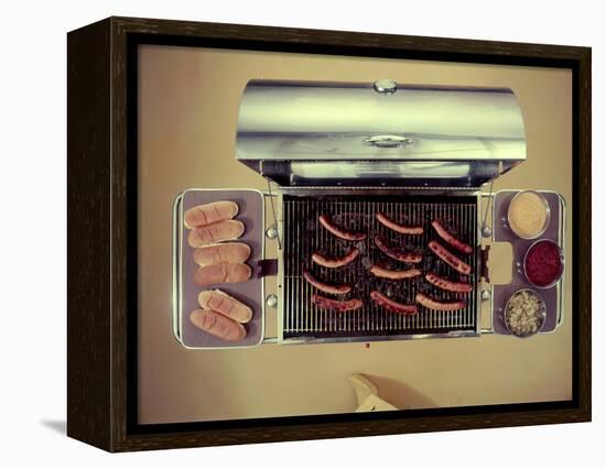 Stainless Steel Barbecue Grill, Upon Which are Buns, Hot Dogs, and Condiments, 1960-Eliot Elisofon-Framed Premier Image Canvas