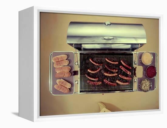 Stainless Steel Barbecue Grill, Upon Which are Buns, Hot Dogs, and Condiments, 1960-Eliot Elisofon-Framed Premier Image Canvas