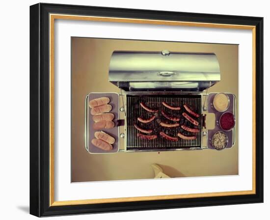 Stainless Steel Barbecue Grill, Upon Which are Buns, Hot Dogs, and Condiments, 1960-Eliot Elisofon-Framed Photographic Print