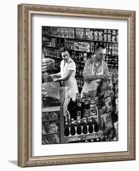 Stan Wentland and Wife Jo Restock Grocery Store, Rockford, Illinois-Margaret Bourke-White-Framed Photographic Print