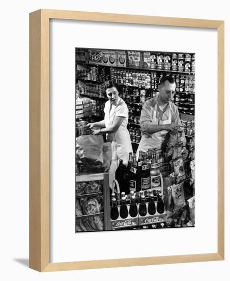 Stan Wentland and Wife Jo Restock Grocery Store, Rockford, Illinois-Margaret Bourke-White-Framed Photographic Print