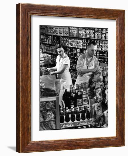 Stan Wentland and Wife Jo Restock Grocery Store, Rockford, Illinois-Margaret Bourke-White-Framed Photographic Print