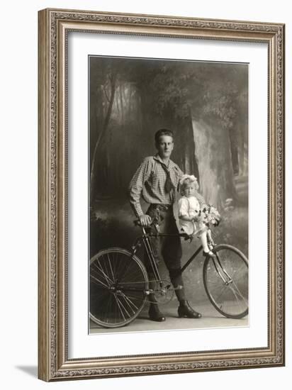Standing Bicyclist with Little Girl on Handlebars-null-Framed Art Print