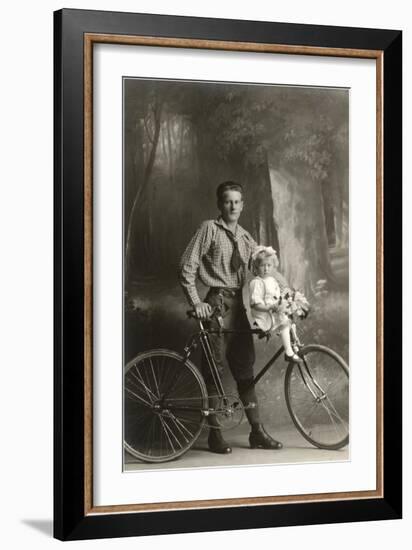 Standing Bicyclist with Little Girl on Handlebars-null-Framed Art Print