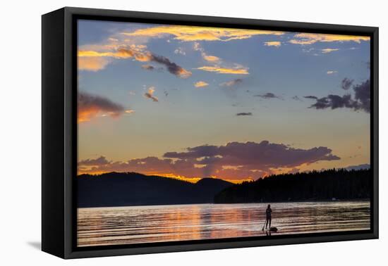 Standup Paddleboarder Silhouetted by Sunset, Whitefish Lake, Montana-Chuck Haney-Framed Premier Image Canvas