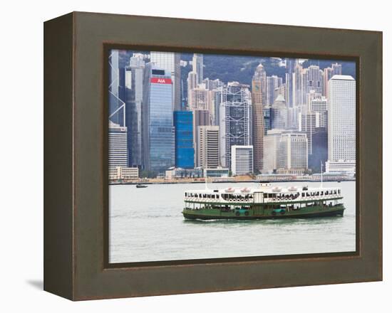 Star Ferry Crosses Victoria Harbour with Hong Kong Island Skyline Behind, Hong Kong, China, Asia-Amanda Hall-Framed Premier Image Canvas