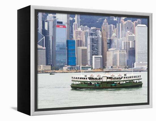 Star Ferry Crosses Victoria Harbour with Hong Kong Island Skyline Behind, Hong Kong, China, Asia-Amanda Hall-Framed Premier Image Canvas