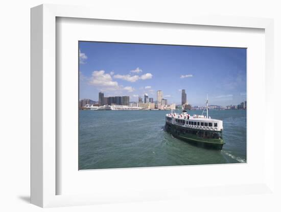 Star Ferry sailing towards the Kowloon side of Victoria Harbour, Hong Kong, China, Asia-Fraser Hall-Framed Photographic Print