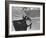 State Trooper Holding Burnt Cap of a Guard Taken Hostage During Riot at Attica State Prison-John Shearer-Framed Photographic Print