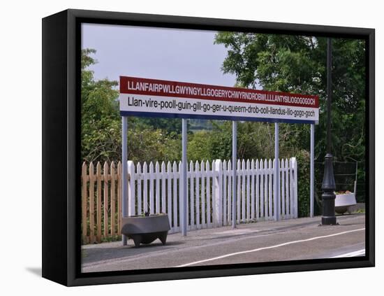 Station Sign at Llanfairpwllgwyngyllgo-Gerychwyrndrobwllllantysiliogogogoch-Nigel Blythe-Framed Premier Image Canvas