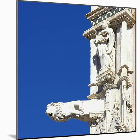 Statue of a Man and a Lion Gargoyle, Architectural Detail, Siena, Italy-Mike Burton-Mounted Photographic Print