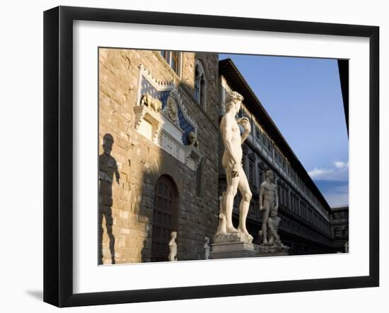 Statue of David with Shadow, Ufizzi in Background, Piazza Della Signoria, Florence, Tuscany, Italy-Martin Child-Framed Photographic Print