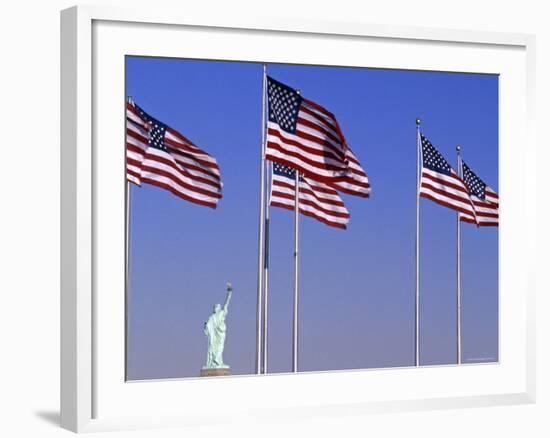 Statue of Liberty and Us Flags, New York City, USA-Walter Bibikow-Framed Photographic Print