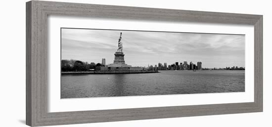 Statue of Liberty with Manhattan Skyline in the Background, Ellis Island, New Jersey-null-Framed Photographic Print