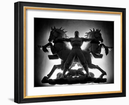 Statue of Man and Horses Being Lit from Behind at the New York World's Fair-David Scherman-Framed Photographic Print