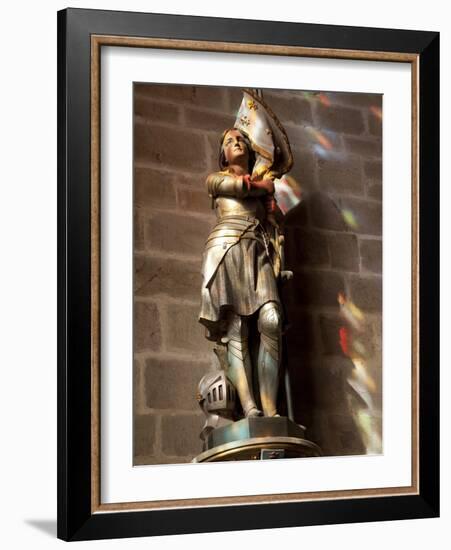 Statue of St. Joan of Arc with Coloured Light from Stained Glass, Church of Notre Dame, Vitre, Brit-Nick Servian-Framed Photographic Print
