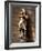 Statue of St. Joan of Arc with Coloured Light from Stained Glass, Church of Notre Dame, Vitre, Brit-Nick Servian-Framed Photographic Print