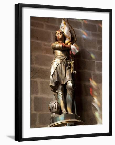 Statue of St. Joan of Arc with Coloured Light from Stained Glass, Church of Notre Dame, Vitre, Brit-Nick Servian-Framed Photographic Print