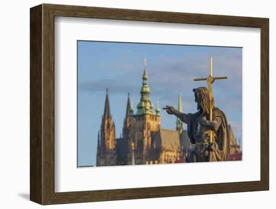 Statue of St. John the Baptist on the Charles Bridge with the Prague Castle and St. Vitus Cathedral-Tom Haseltine-Framed Photographic Print