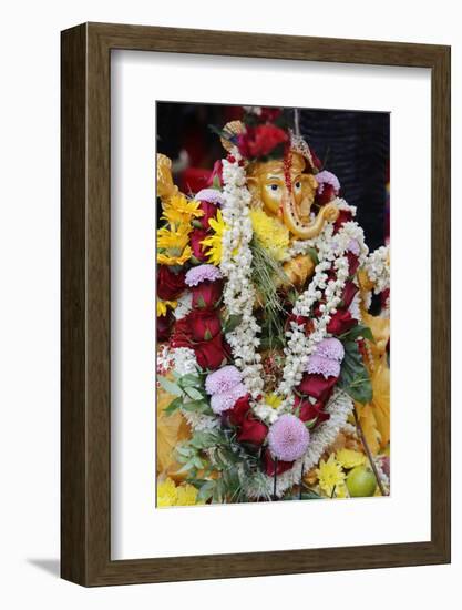 Statue of the Hindu God Ganesh with Garlands, Paris, France, Europe-Godong-Framed Photographic Print