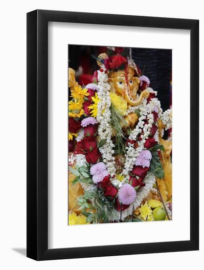Statue of the Hindu God Ganesh with Garlands, Paris, France, Europe-Godong-Framed Photographic Print