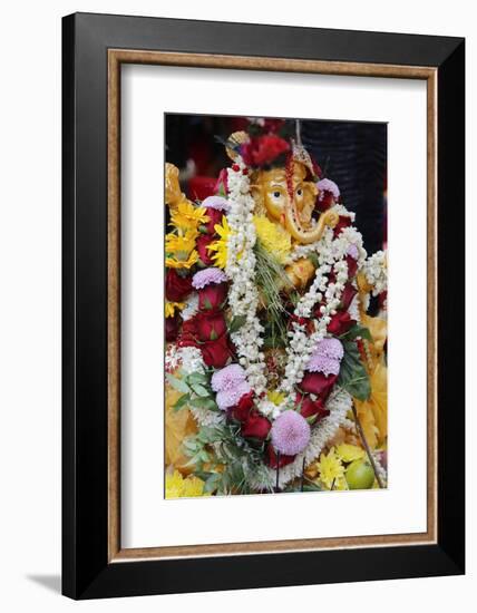 Statue of the Hindu God Ganesh with Garlands, Paris, France, Europe-Godong-Framed Photographic Print