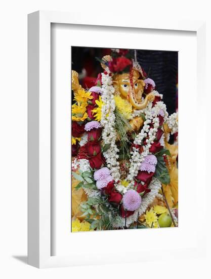 Statue of the Hindu God Ganesh with Garlands, Paris, France, Europe-Godong-Framed Photographic Print