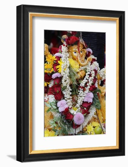 Statue of the Hindu God Ganesh with Garlands, Paris, France, Europe-Godong-Framed Photographic Print