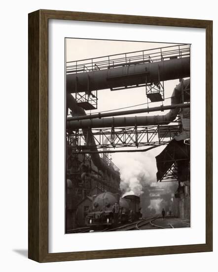 Steaming Hot Steel Slag Being Poured into Freight Cars on Railroad Siding at Steel Plant-Margaret Bourke-White-Framed Photographic Print