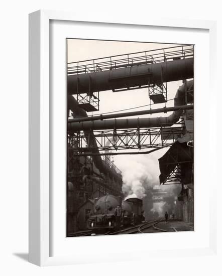 Steaming Hot Steel Slag Being Poured into Freight Cars on Railroad Siding at Steel Plant-Margaret Bourke-White-Framed Photographic Print