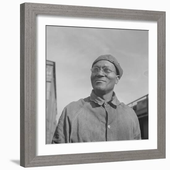 Steel car repairer and rivet driver, at the car shops of the Atchison, Topeka and Santa Fe Railroad-Jack Delano-Framed Photographic Print