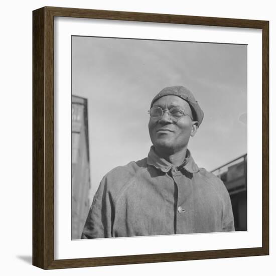 Steel car repairer and rivet driver, at the car shops of the Atchison, Topeka and Santa Fe Railroad-Jack Delano-Framed Photographic Print