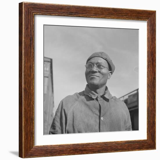 Steel car repairer and rivet driver, at the car shops of the Atchison, Topeka and Santa Fe Railroad-Jack Delano-Framed Photographic Print