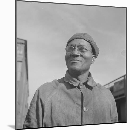 Steel car repairer and rivet driver, at the car shops of the Atchison, Topeka and Santa Fe Railroad-Jack Delano-Mounted Photographic Print