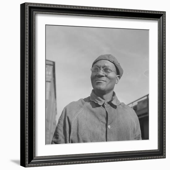 Steel car repairer and rivet driver, at the car shops of the Atchison, Topeka and Santa Fe Railroad-Jack Delano-Framed Photographic Print